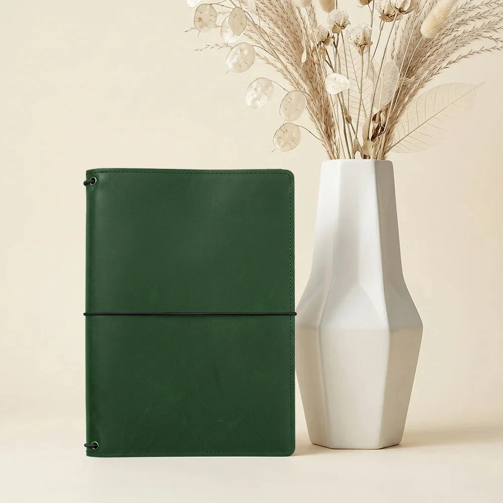 Genuine leather refillable journal cover featuring card pockets and three elastic notebook holders.