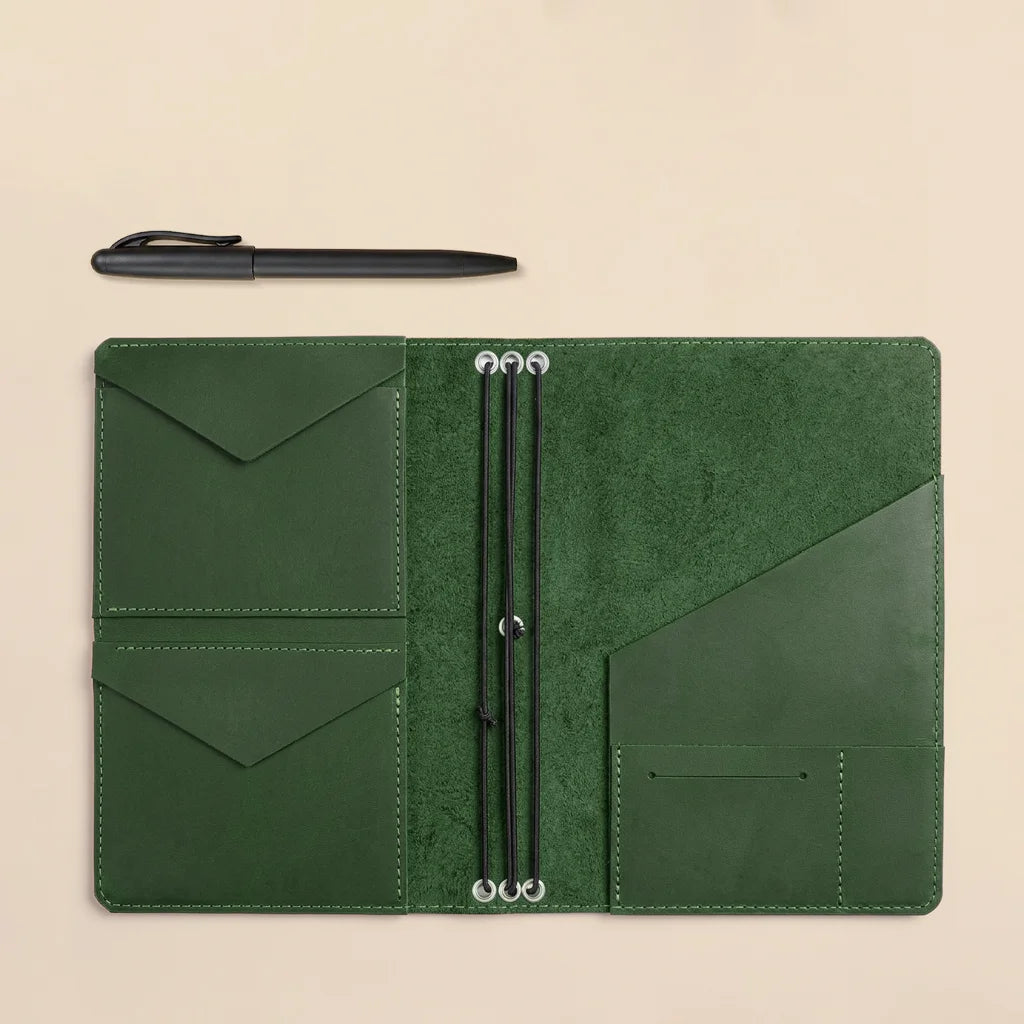 Leather refillable journal cover with durable elastic system and premium handcrafted construction.