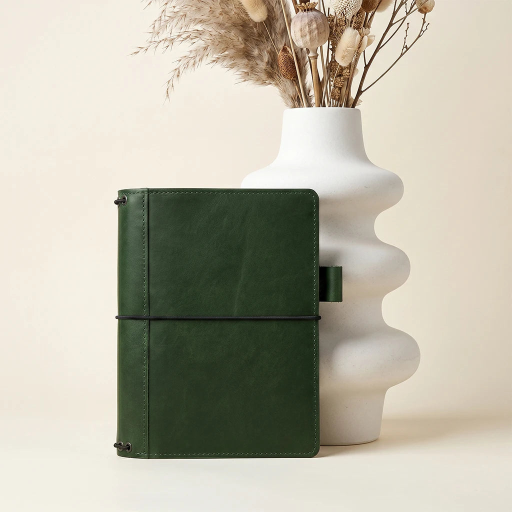 Genuine leather notebook cover with interior functionality and elastic system