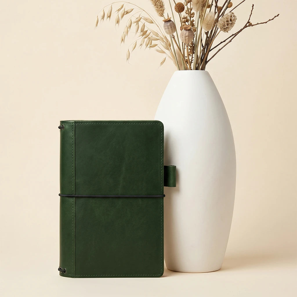 Rustic leather writing cover with elastic notebook holders and inner pockets