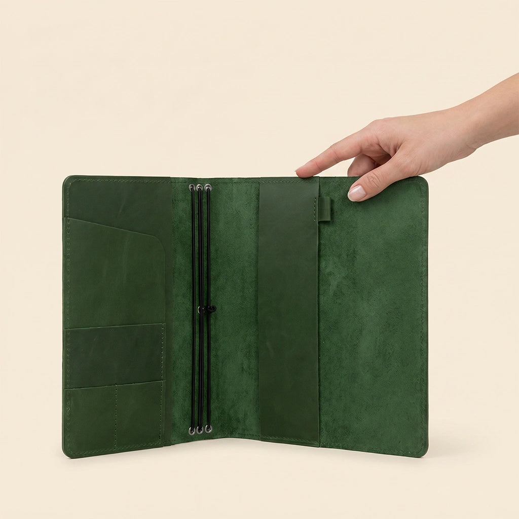 Elegant leather notebook cover offering secure organization for planners and journal inserts.