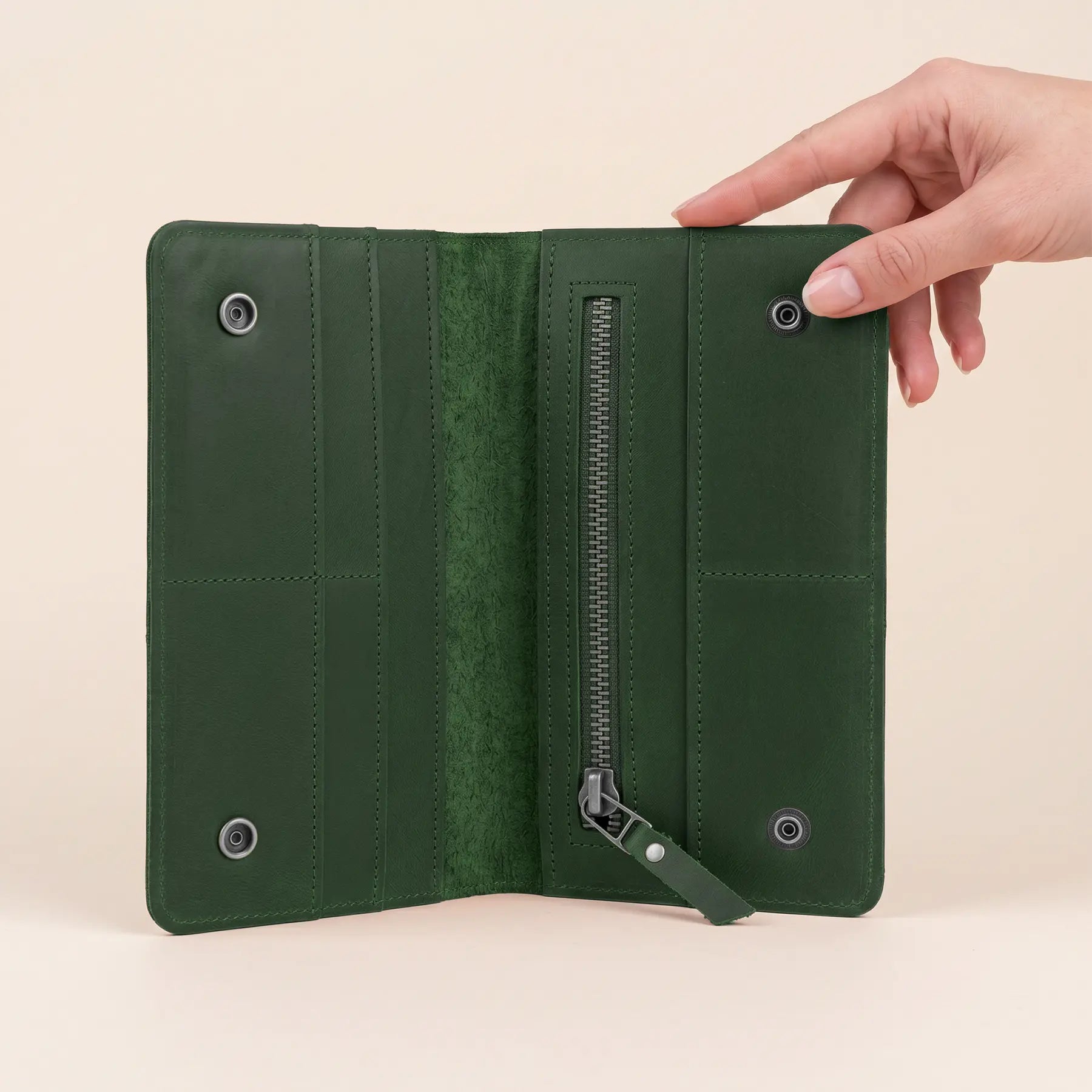 Handmade genuine leather wallet combining snap closure, organized storage, and timeless everyday functionality.