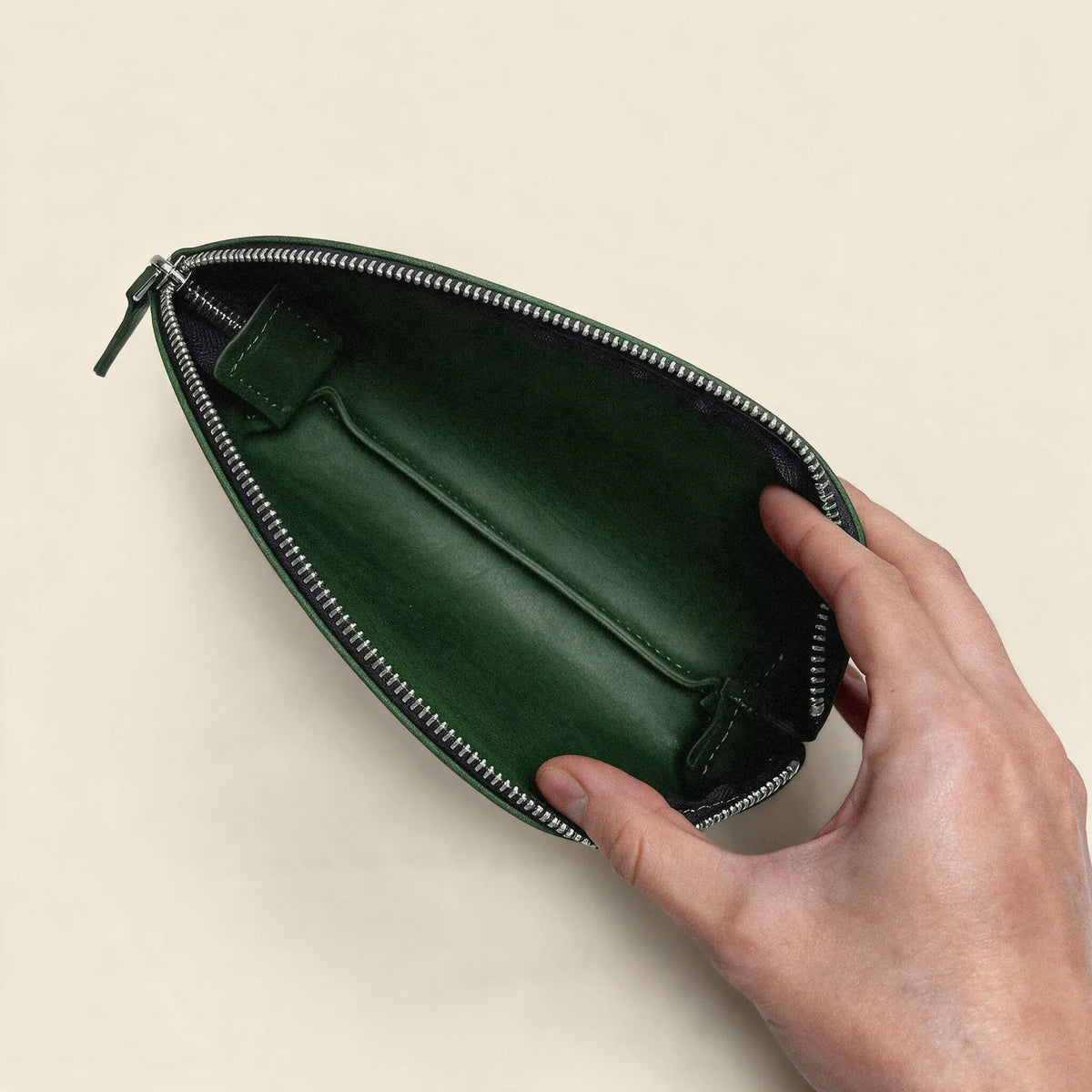 Classic leather cosmetic bag with zipper closure and a clean minimalist appearance