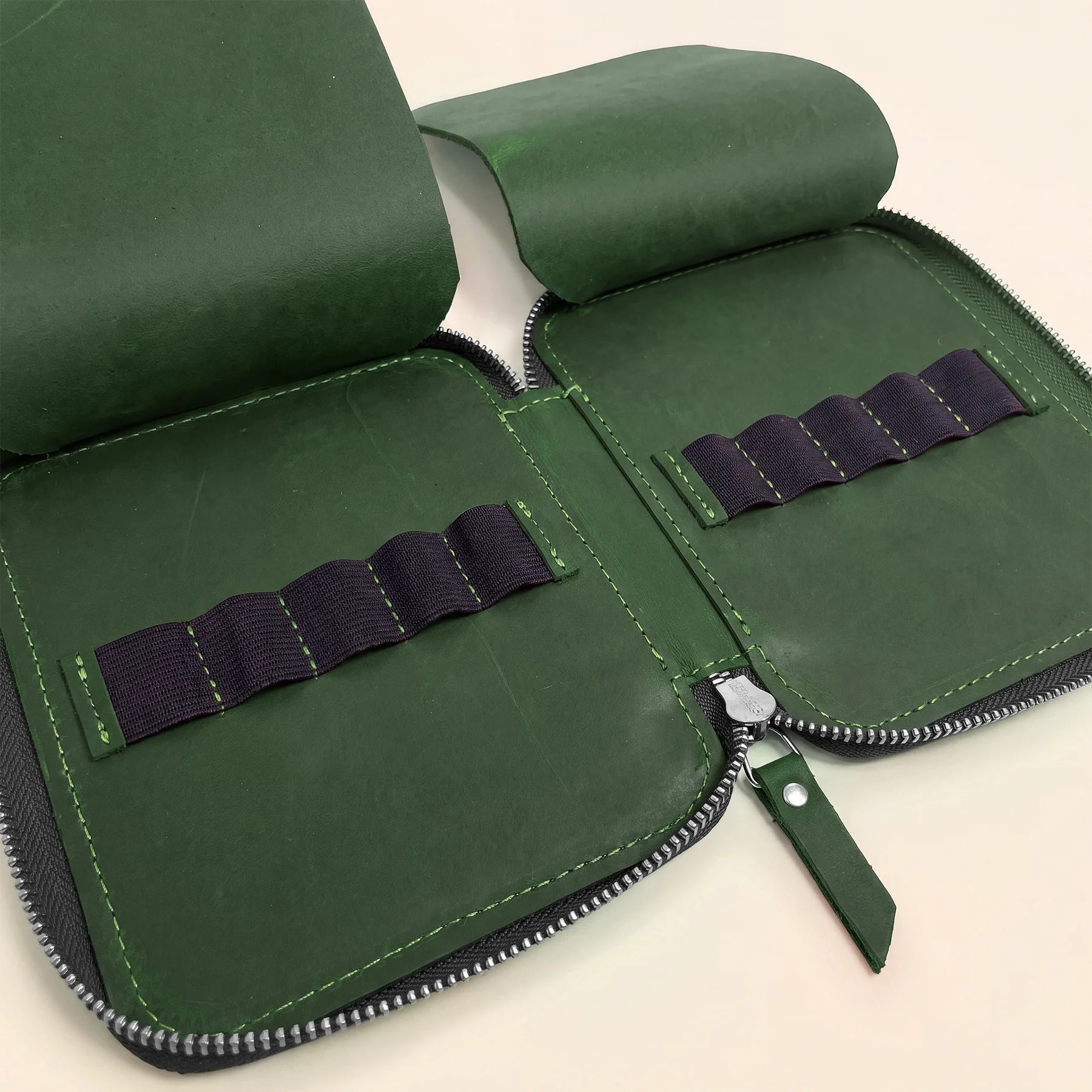 Handmade leather pencil case with zipper, perfect for office and travel essentials.