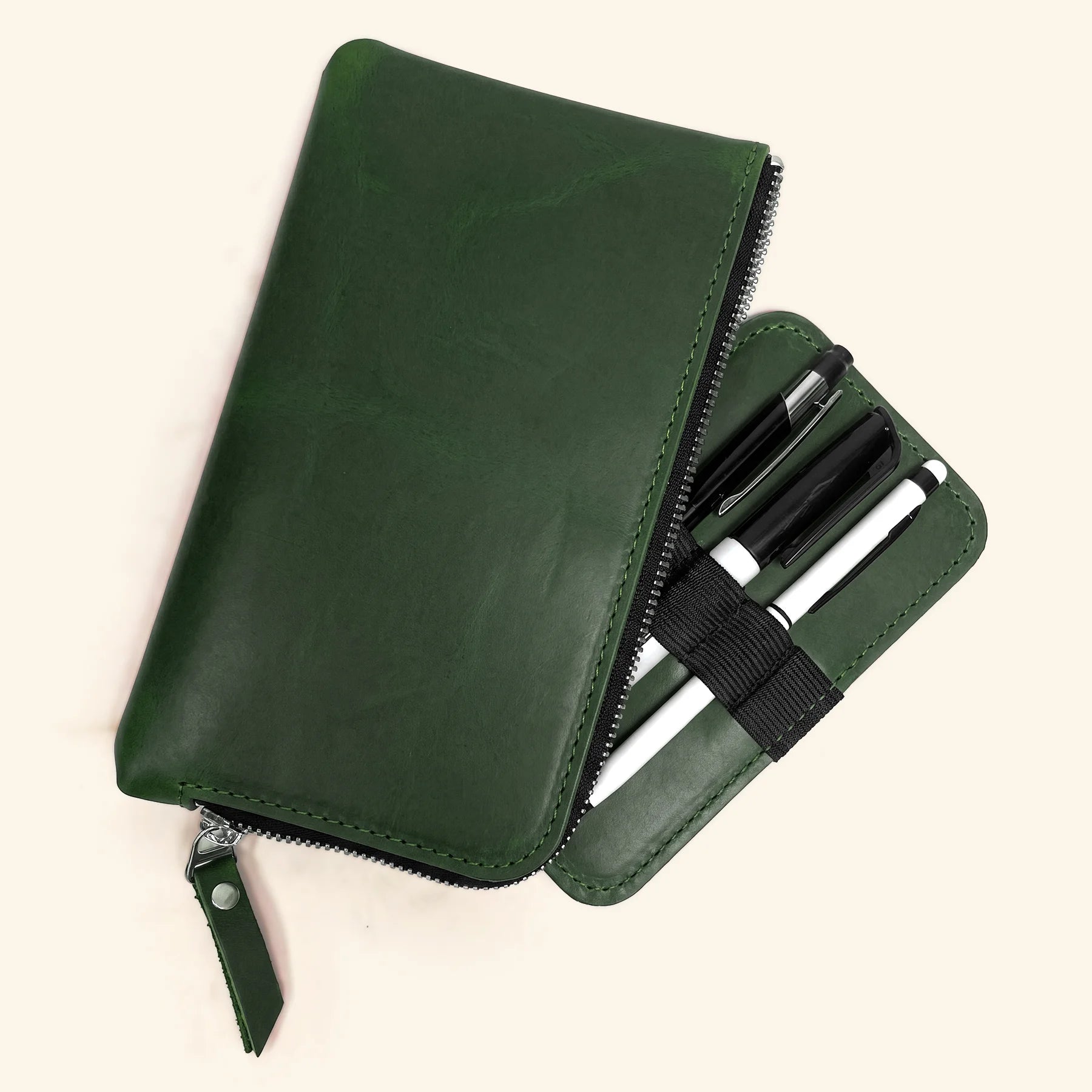 Artisan-crafted leather pencil sleeve with zipper for reliable stationery protection.