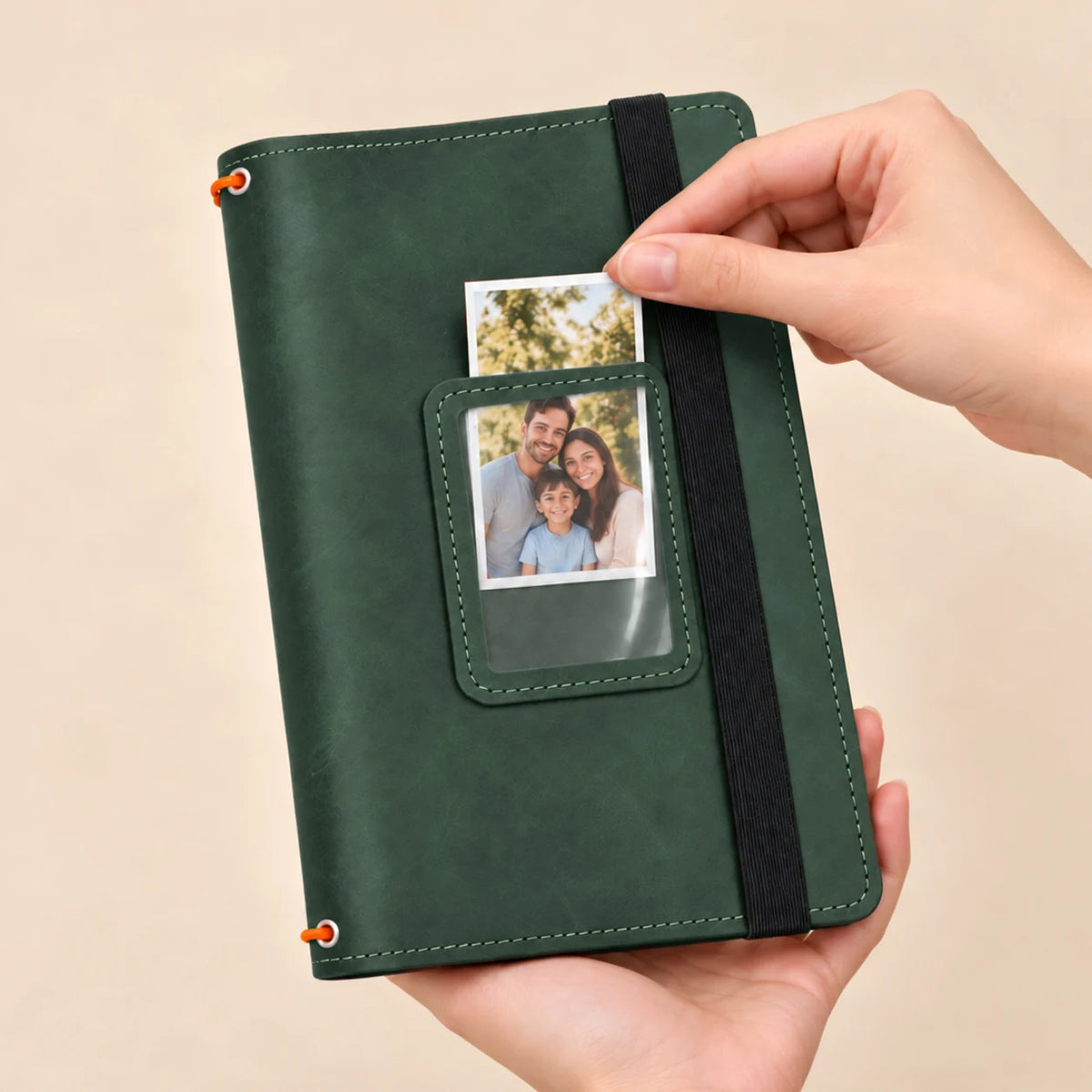 Genuine leather journal organizer featuring three stretch fasteners, practical pockets, and transparent picture insert window.