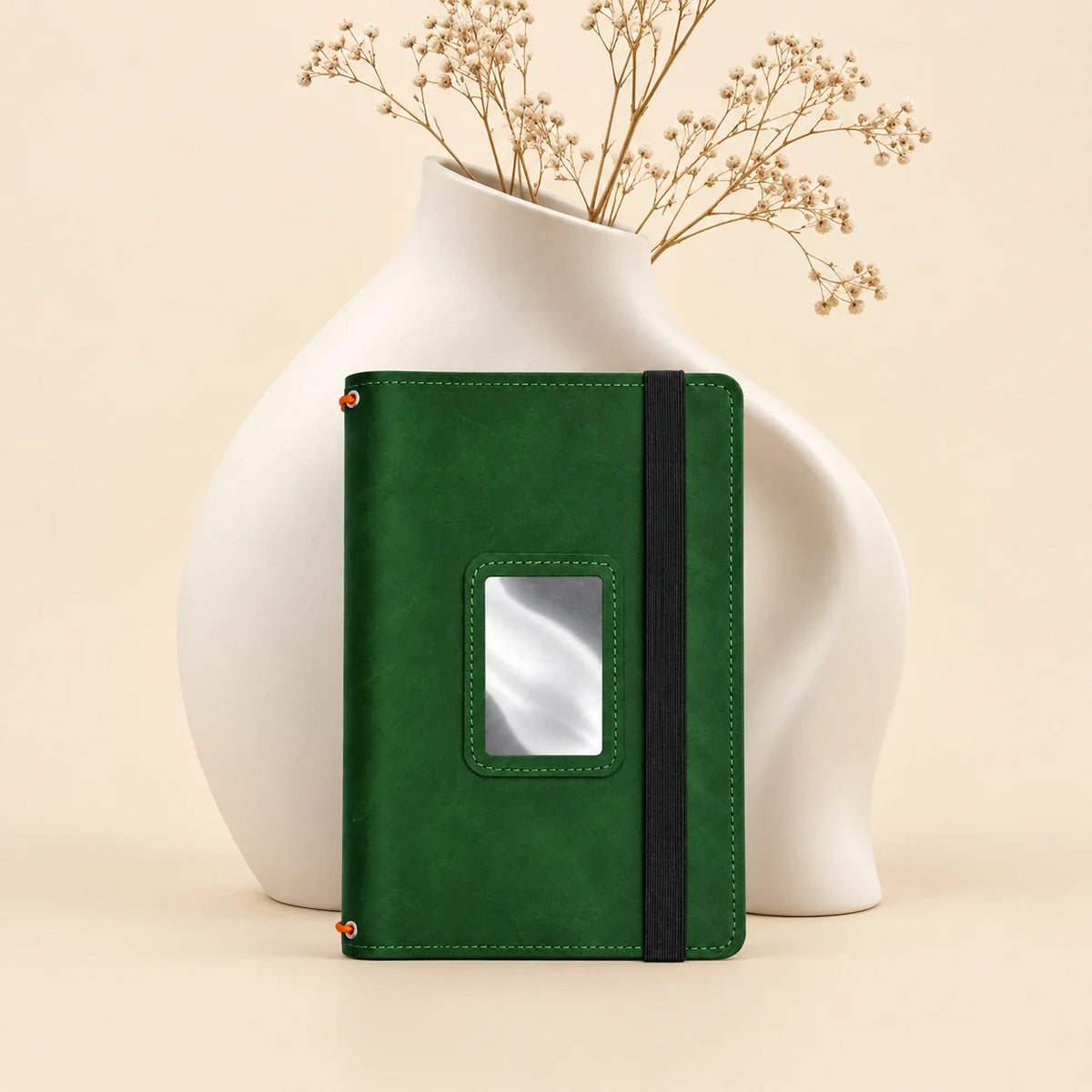 Leather notebook cover with three elastic bands and built-in pockets for everyday organization.