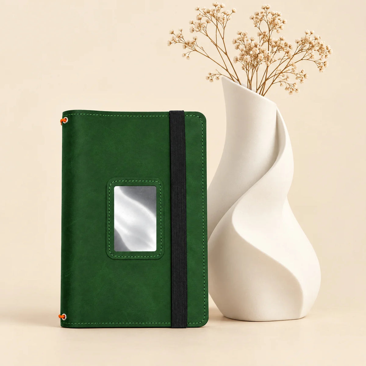 Genuine leather notebook cover with inner pockets and three elastic bands for journals.