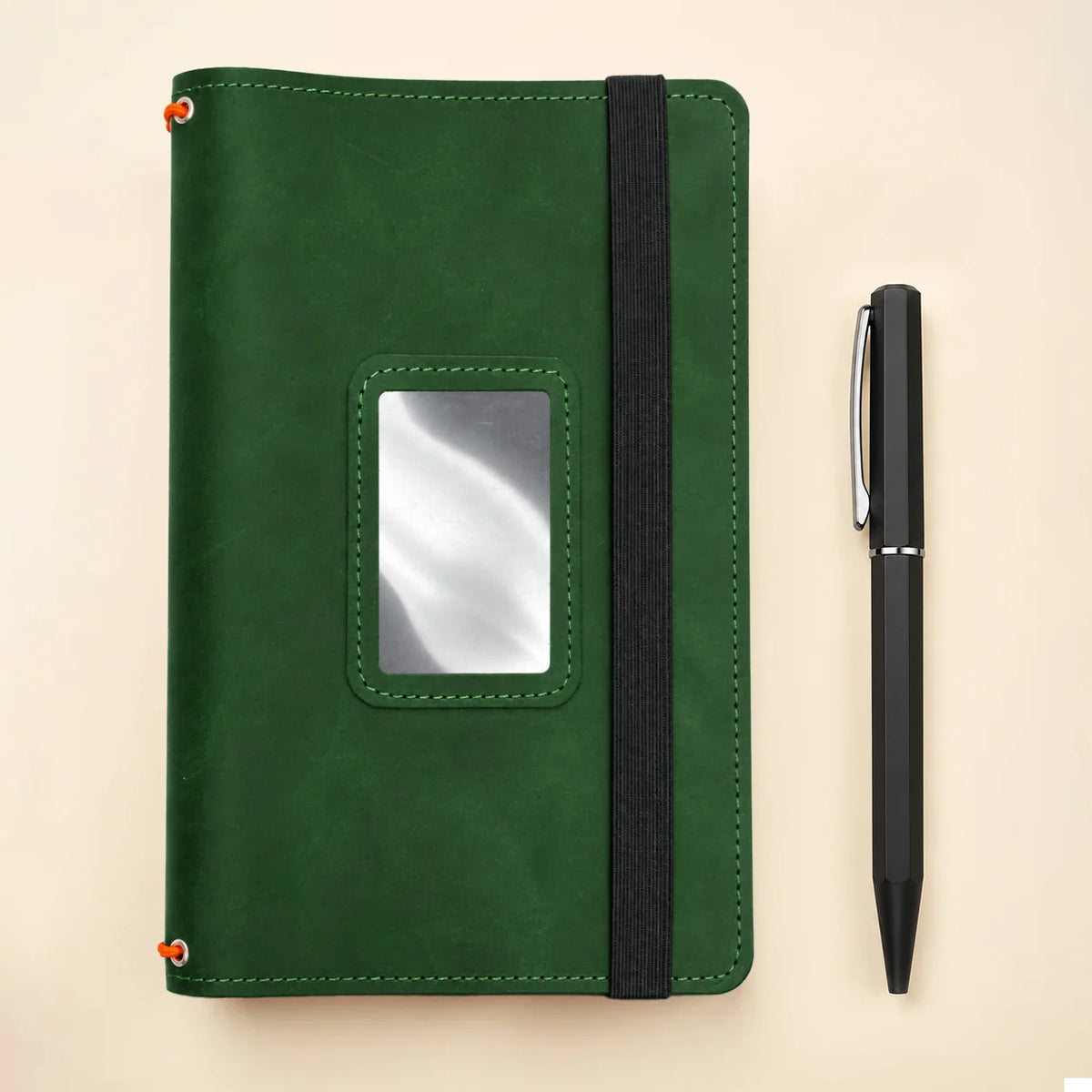 Genuine leather journal holder with three elastic straps and useful compartments inside the cover.