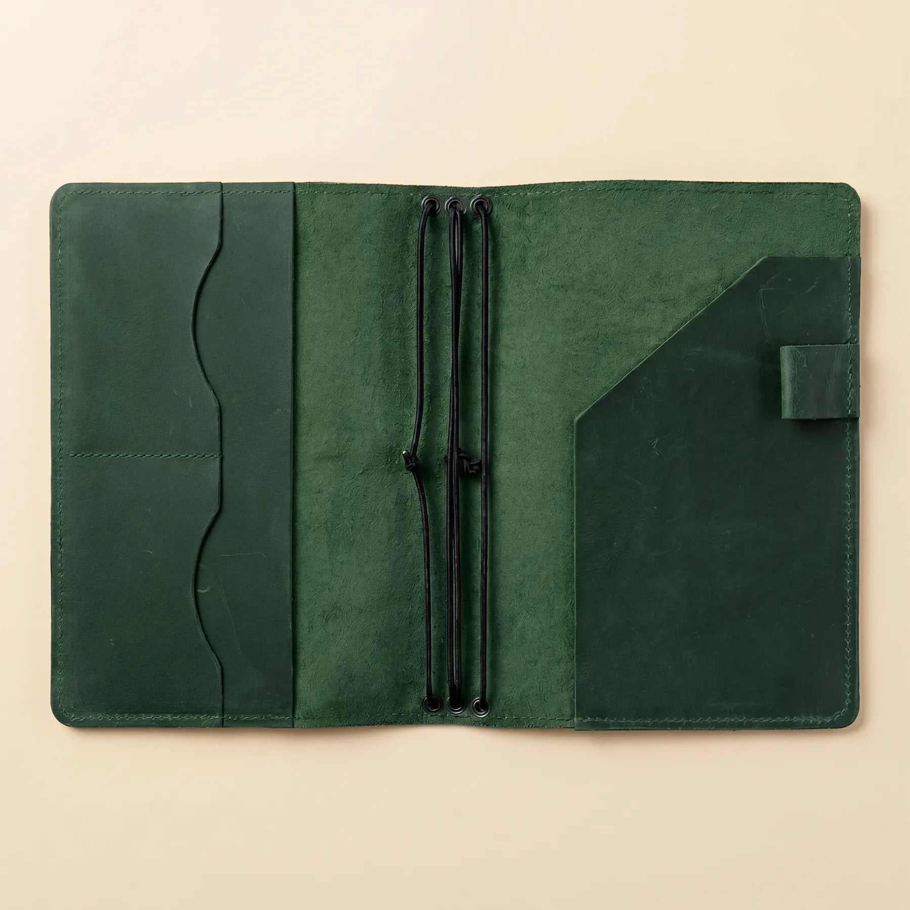 Rustic leather journal organizer featuring handcrafted details and refillable notebook inserts.