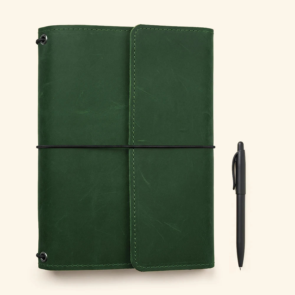 Genuine leather journal sleeve combining refillable functionality with sophisticated handcrafted construction.