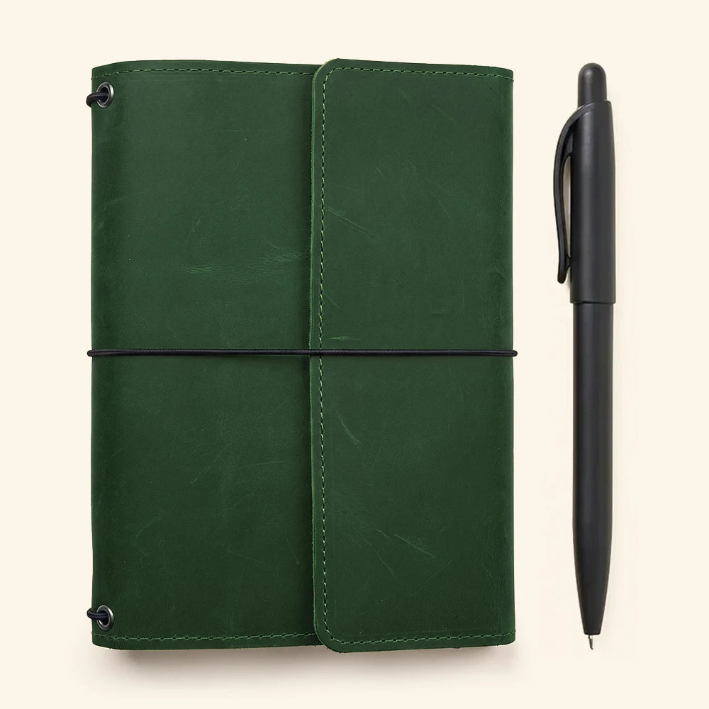 Premium leather notebook organizer with elastic refill system and multiple interior storage pockets.