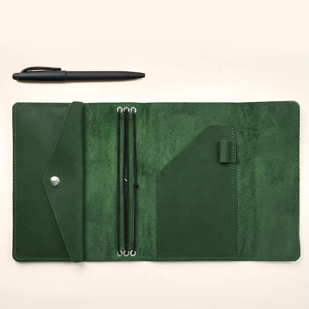 Genuine leather notebook case with refillable inserts and organized storage for daily productivity.