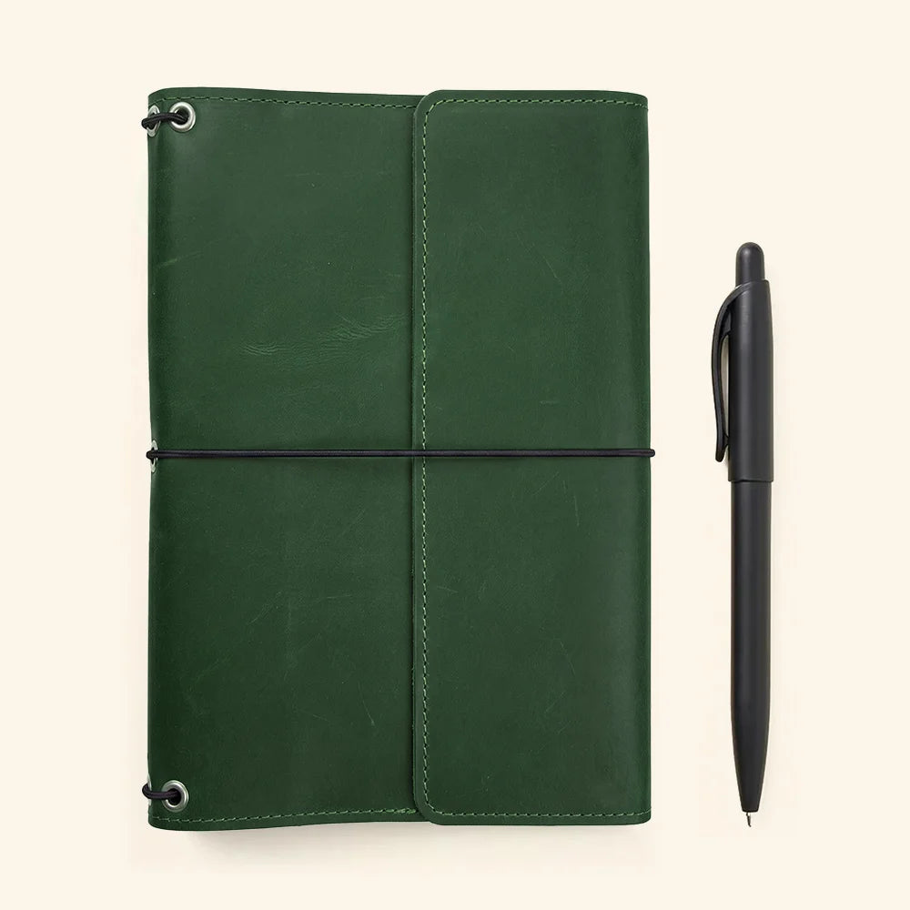 Genuine leather planner holder with timeless design and practical notebook organization features inside.