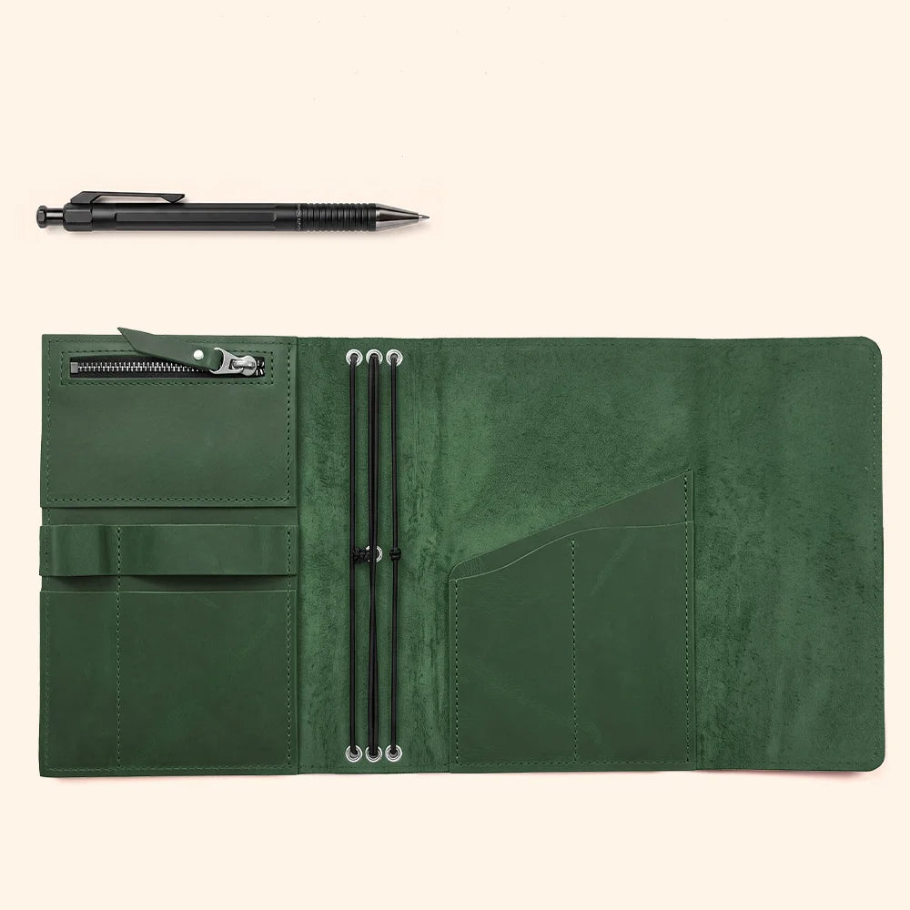 Handcrafted leather notebook cover with slim storage compartments and an elastic writing tool holder.