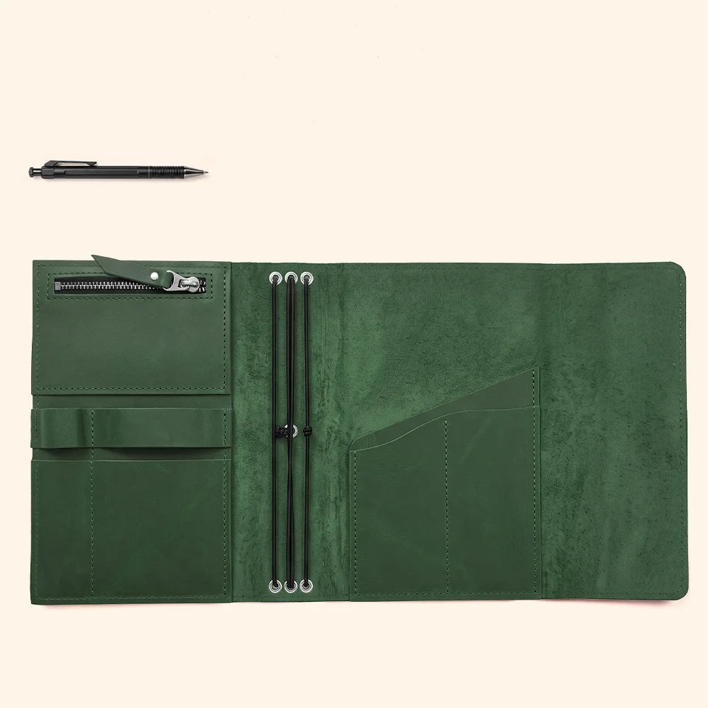 Handmade notebook organizer featuring genuine leather construction, interior pockets, and convenient pen storage.
