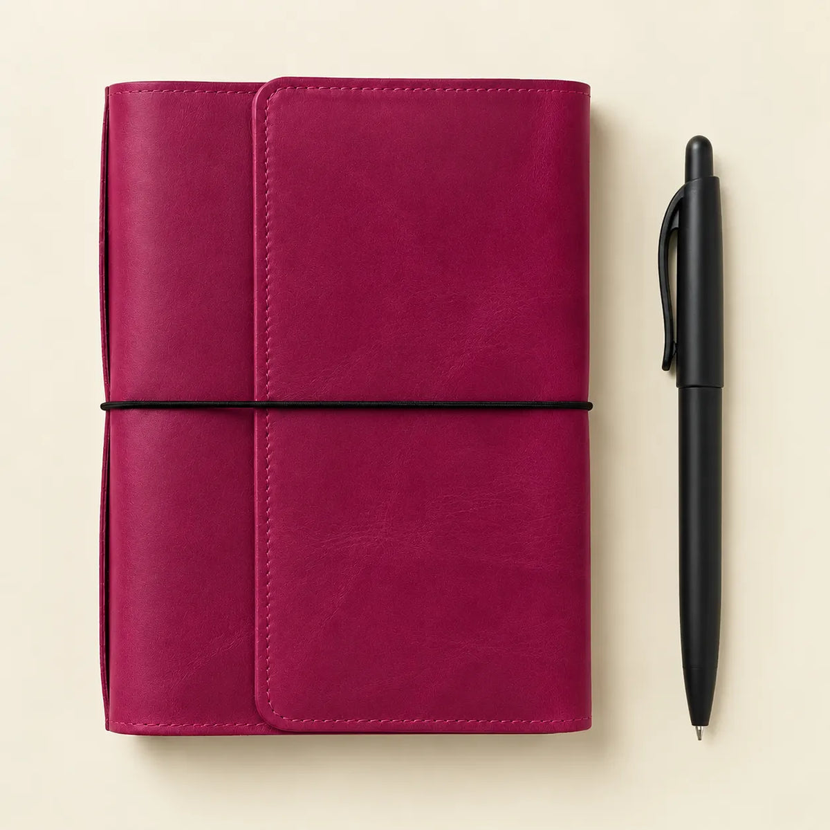 Pink leather journal cover showcasing authentic leather grain and a minimalist handmade style.