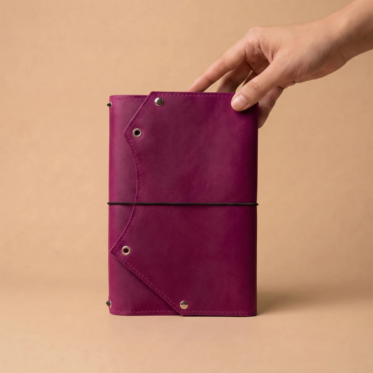 Genuine leather notebook organizer with interior zipper storage for cards, receipts, and keys.