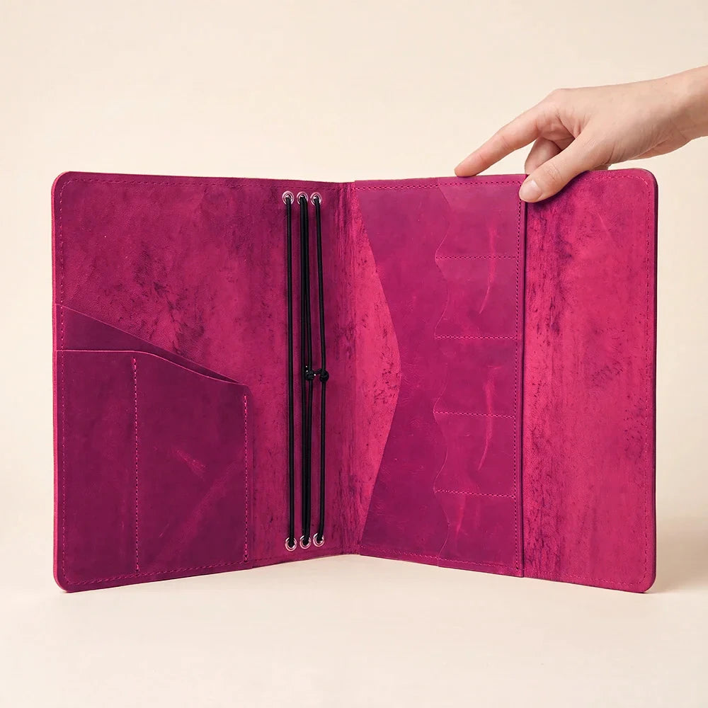 Natural leather journal cover with three elastic bands for flexible notebook storage