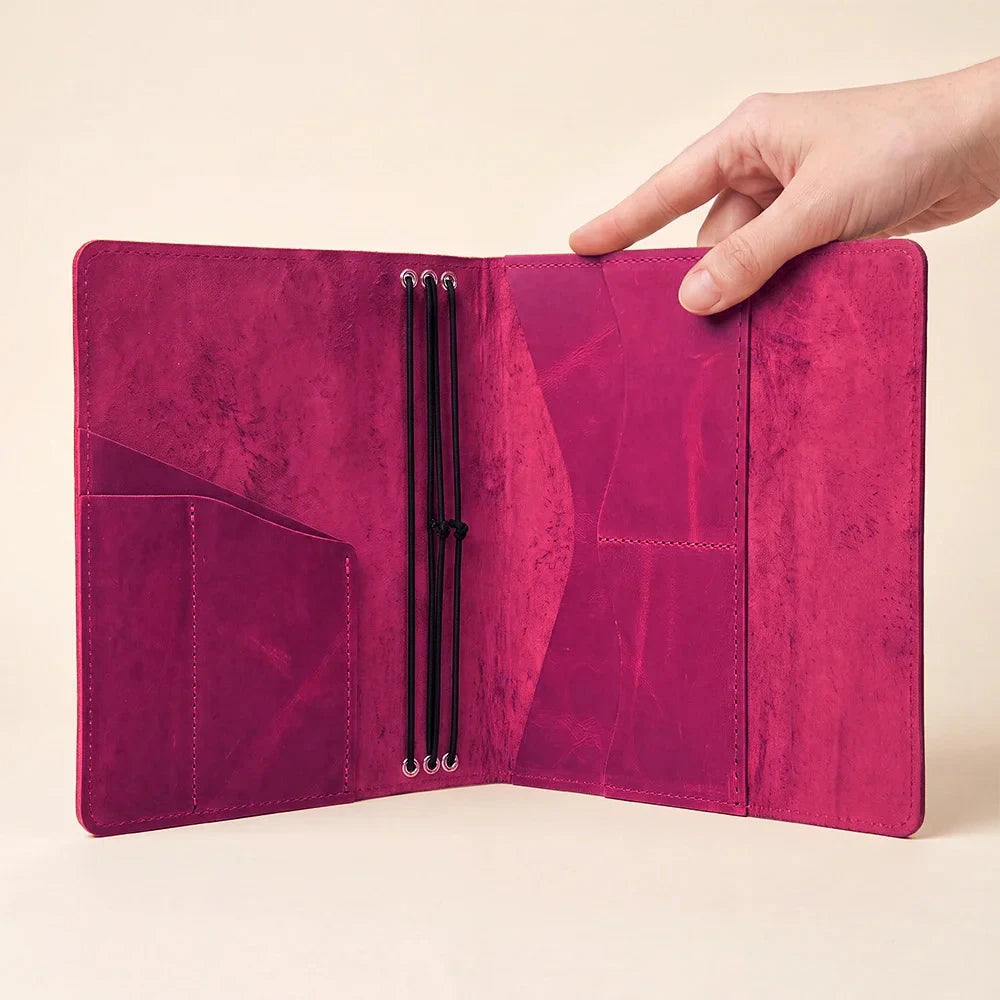Natural leather notebook cover with three elastic closures and practical pockets