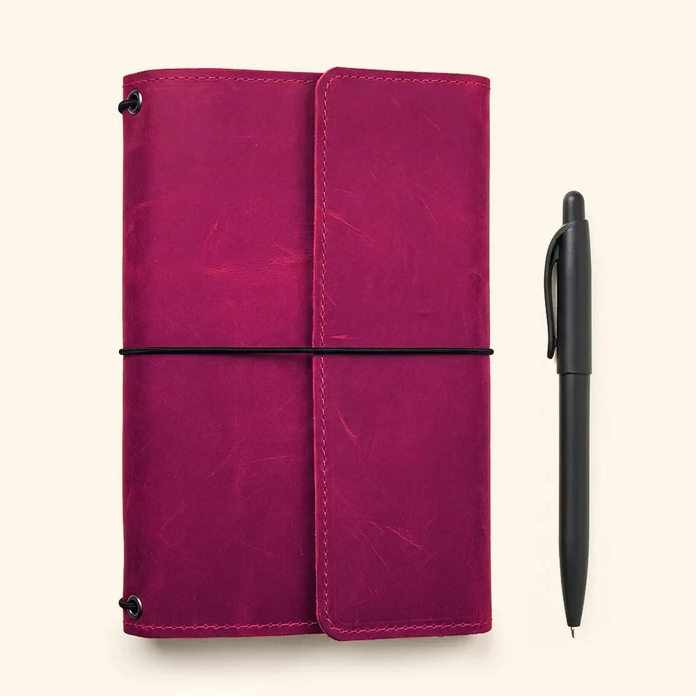 Genuine leather journal cover with three elastic straps for multiple notebooks