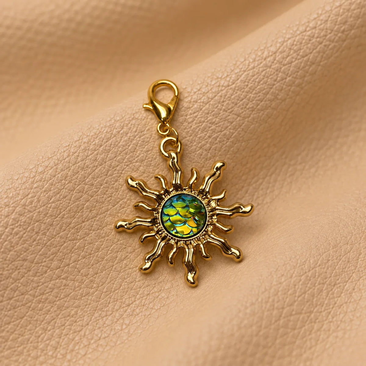 Decorative charm bead attached to a leather notebook, adding a beautiful personal accent.