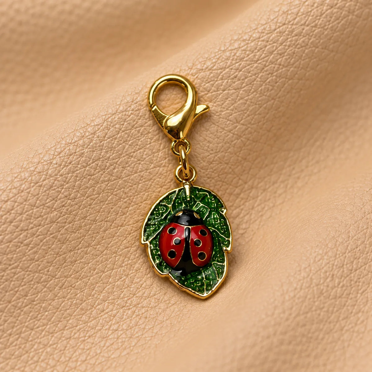 Decorative bead charm clipped onto a journal elastic for an elegant finishing touch.
