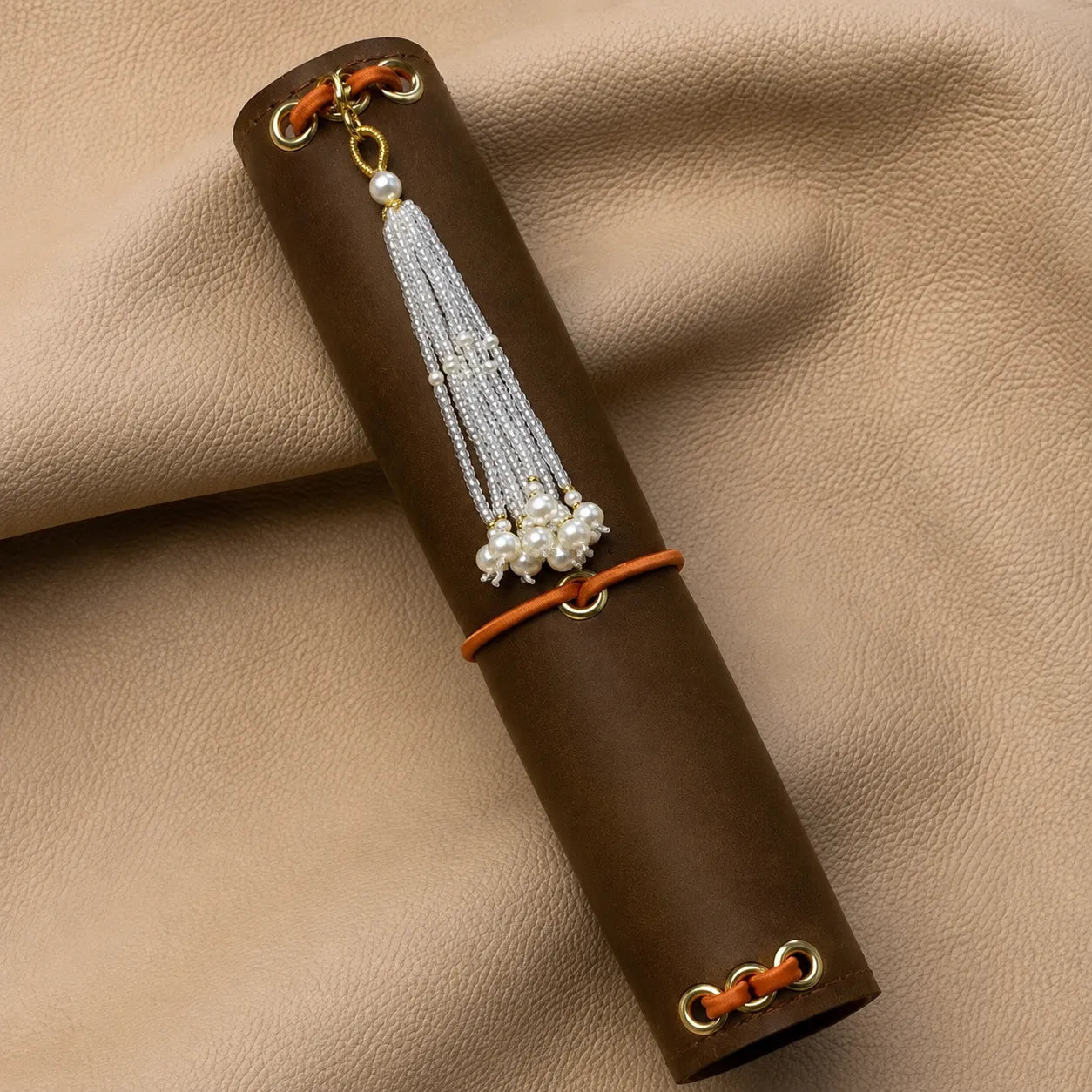 Journal charm with decorative beads attached to notebook elastic, elegant handcrafted journal accessory.