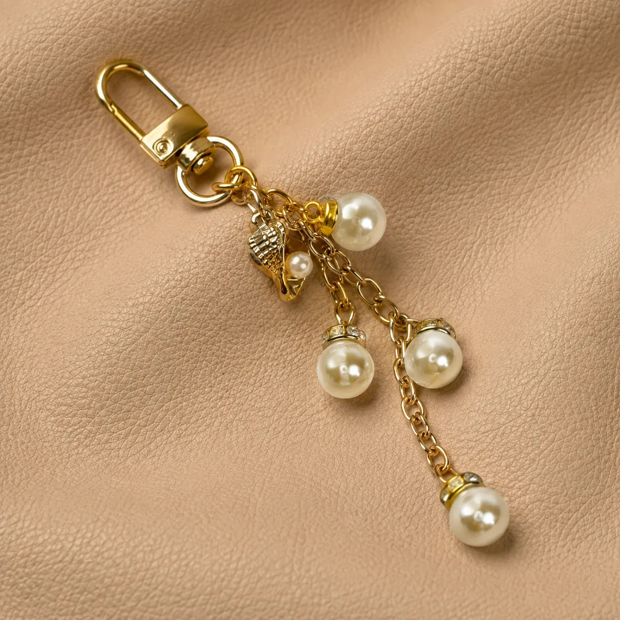 Beaded notebook charm accessory with metal clasp, designed for elastic journal closure decoration