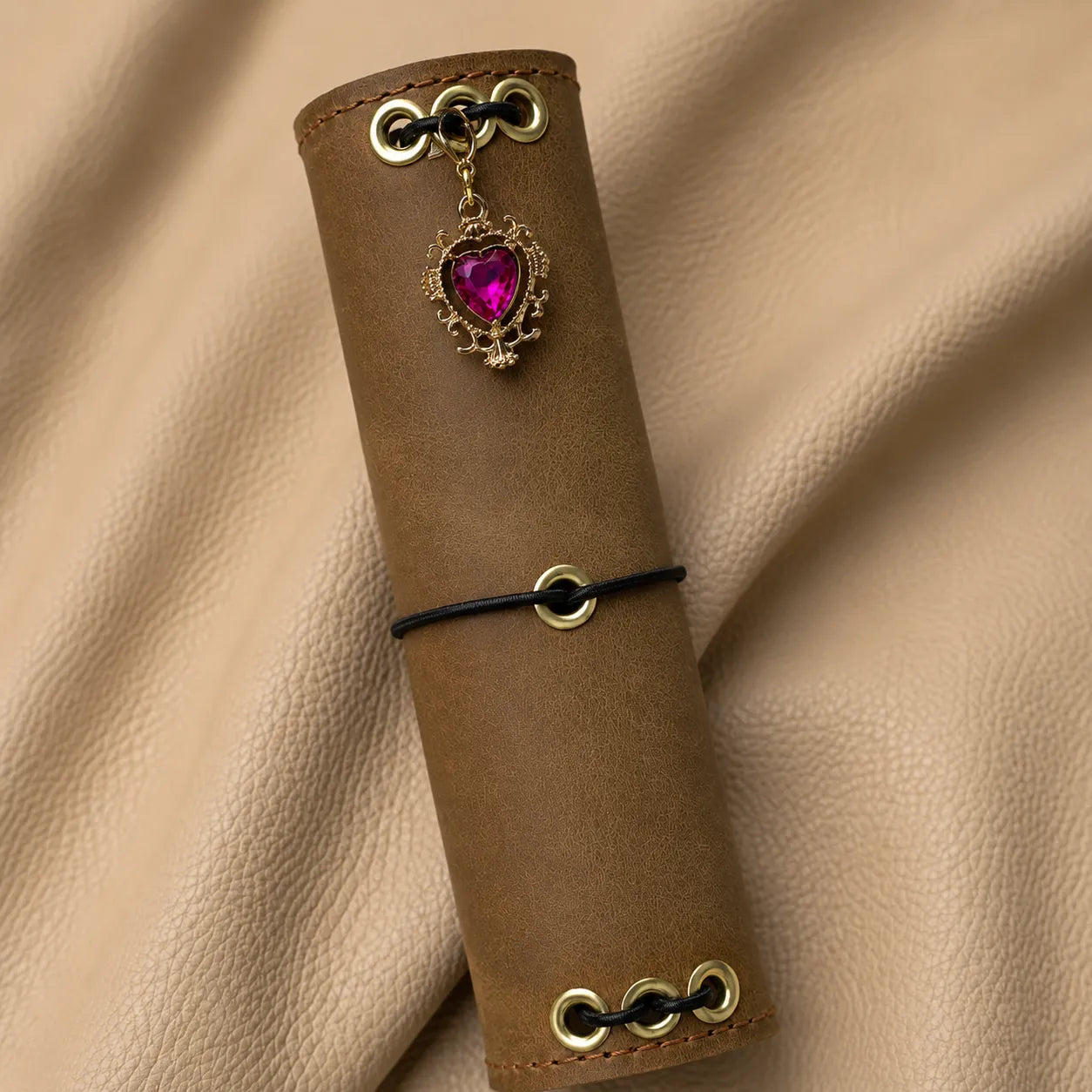 Elegant heart bead notebook charm attached as a stylish journal accessory