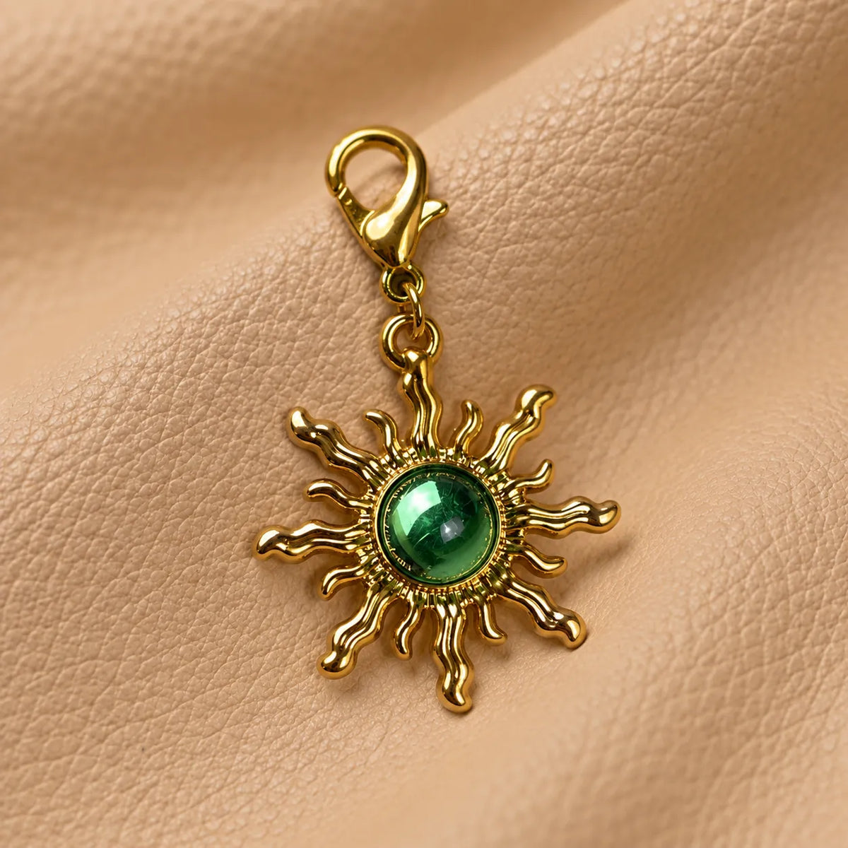 Small beaded charm adorning a leather journal with a delicate decorative finish.