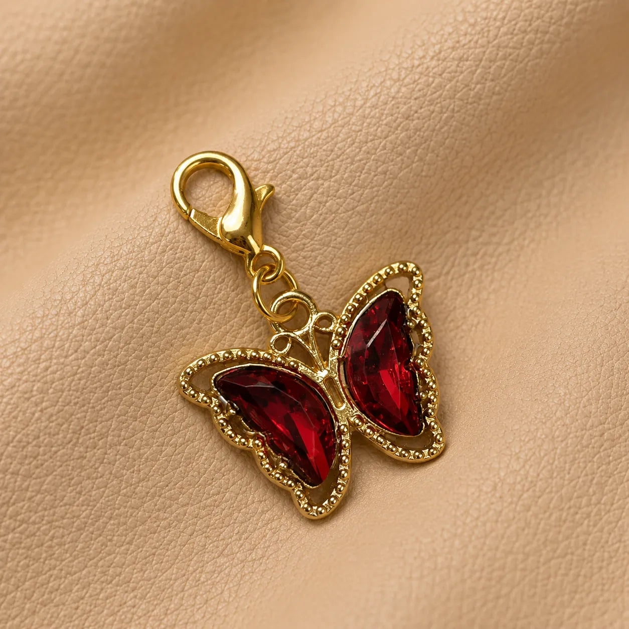 Metal butterfly notebook charm with delicate details, stylish journal accessory for elastic band covers.