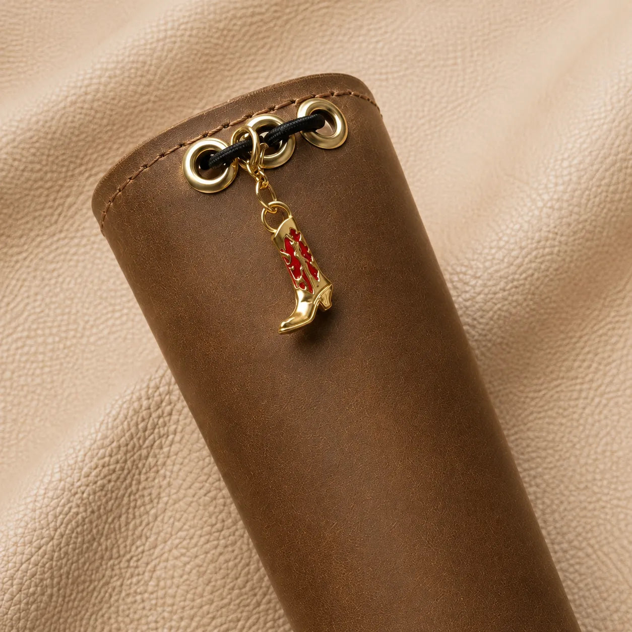 Decorative boot bead journal charm with metal attachment for planners, notebooks, and travel journals