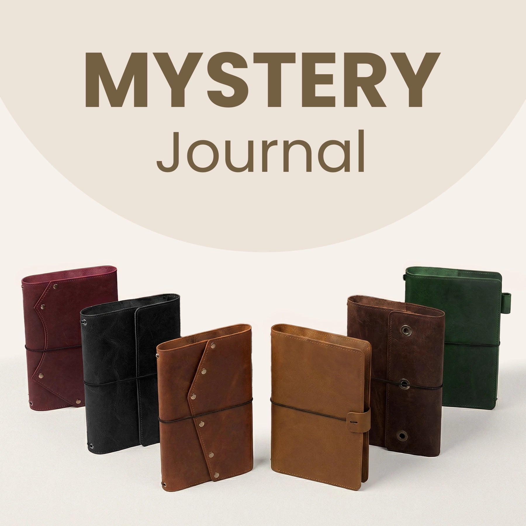 Collection of leather journals in various colors with 'Mystery Journal' text above.