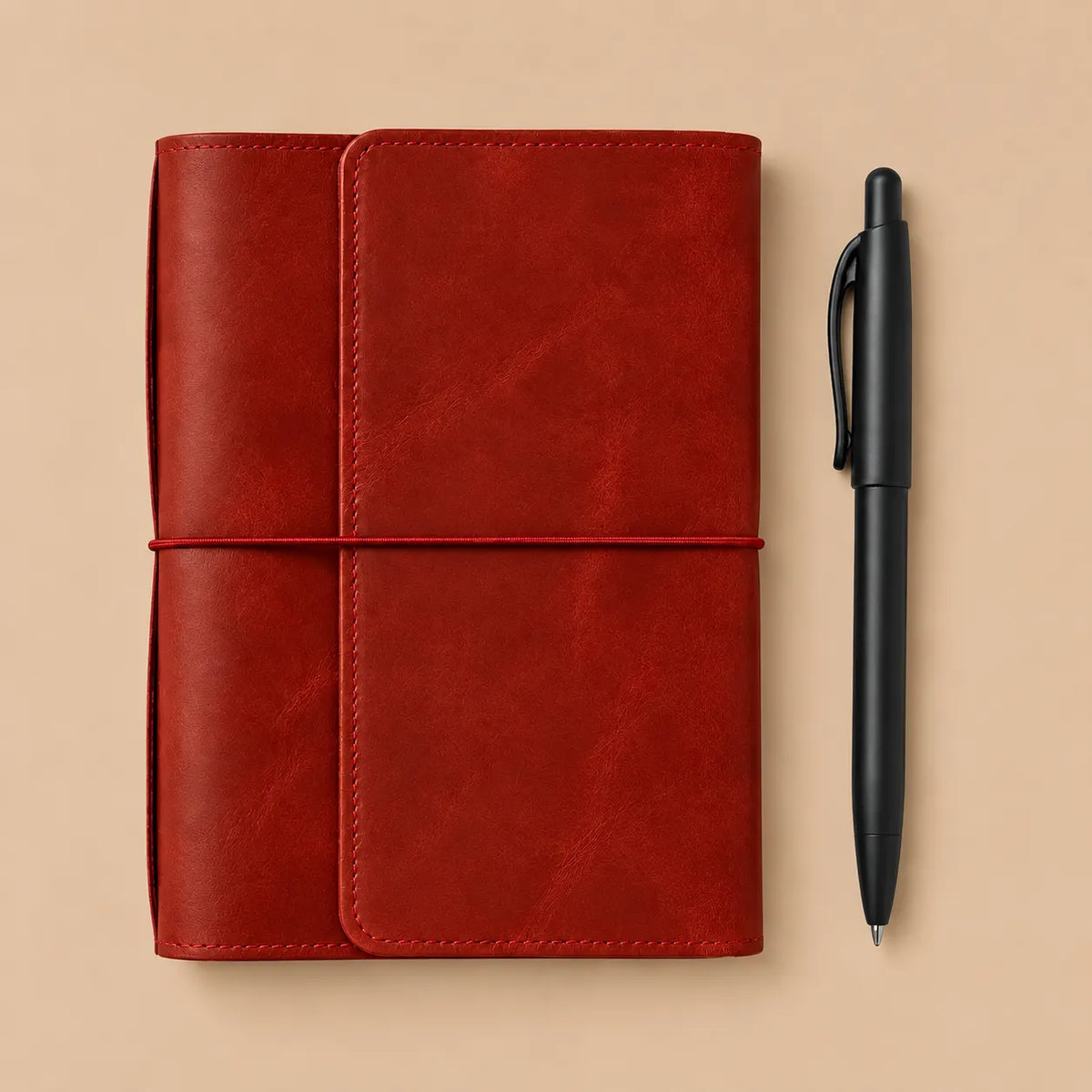 Red genuine leather notebook cover with organized pockets, six elastics, zippered storage, and pen holder.