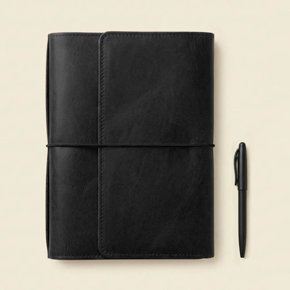 Genuine leather planner cover featuring elastic bands, document pockets, and refillable notebook system.