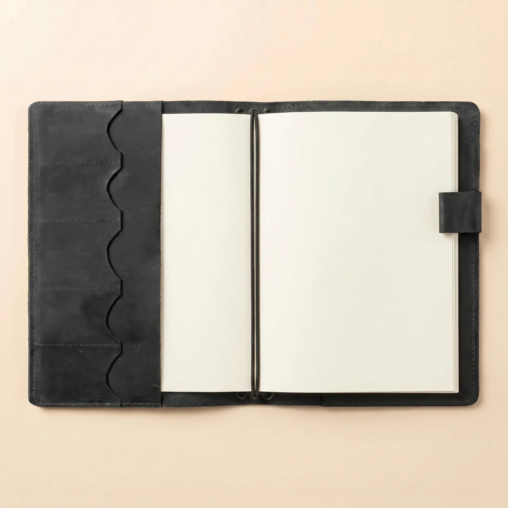 Genuine leather notebook accessory featuring timeless design and lasting durability.