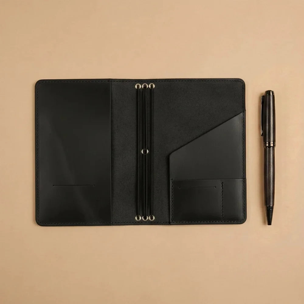 Handmade genuine leather cover for refillable notebooks with multiple elastic fastening bands.