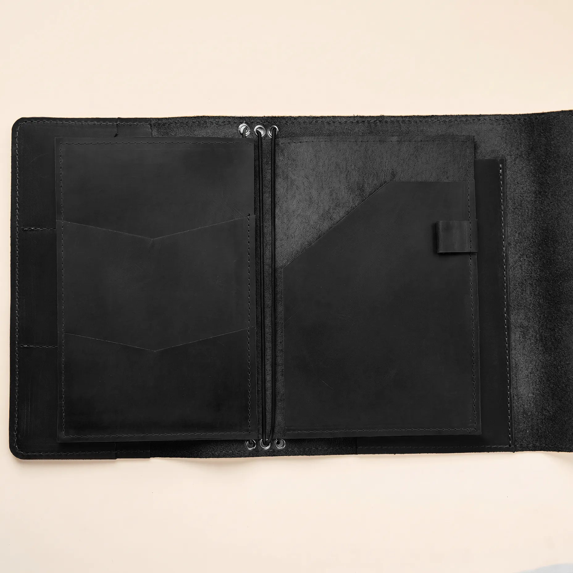 Rustic leather notebook organizer with built-in storage pockets