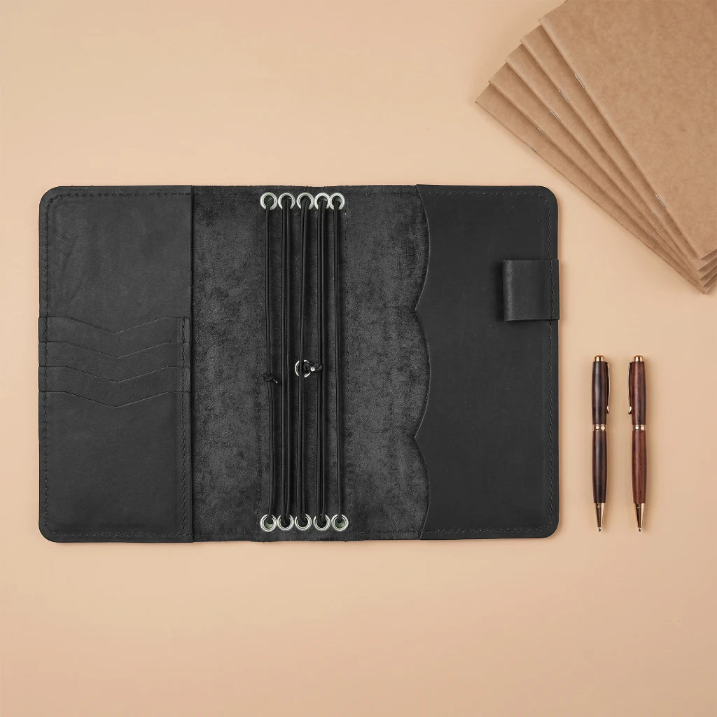 Functional leather journal organizer featuring dedicated pen carrying loop