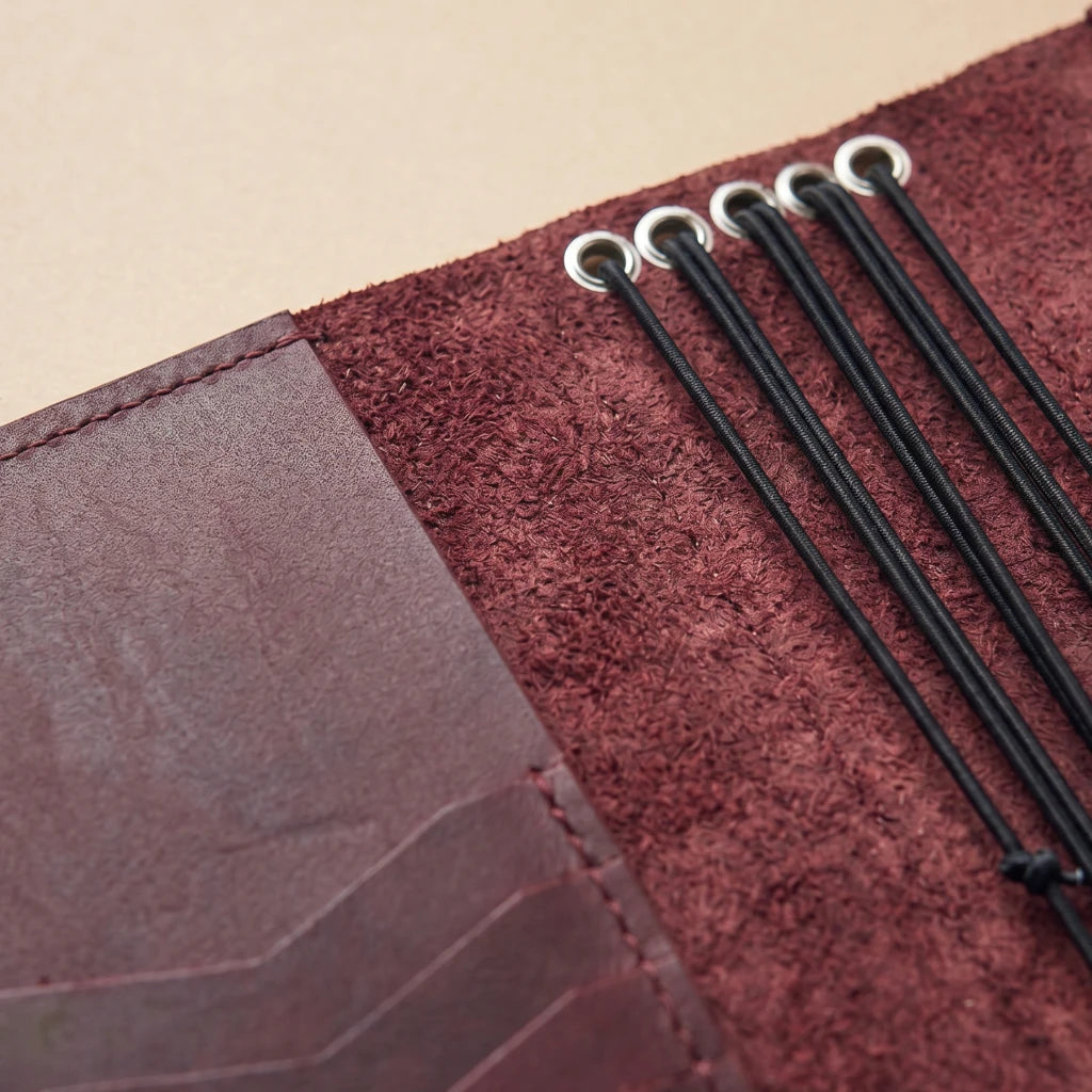 Genuine leather journal organizer with pockets, elastics, and pen loop
