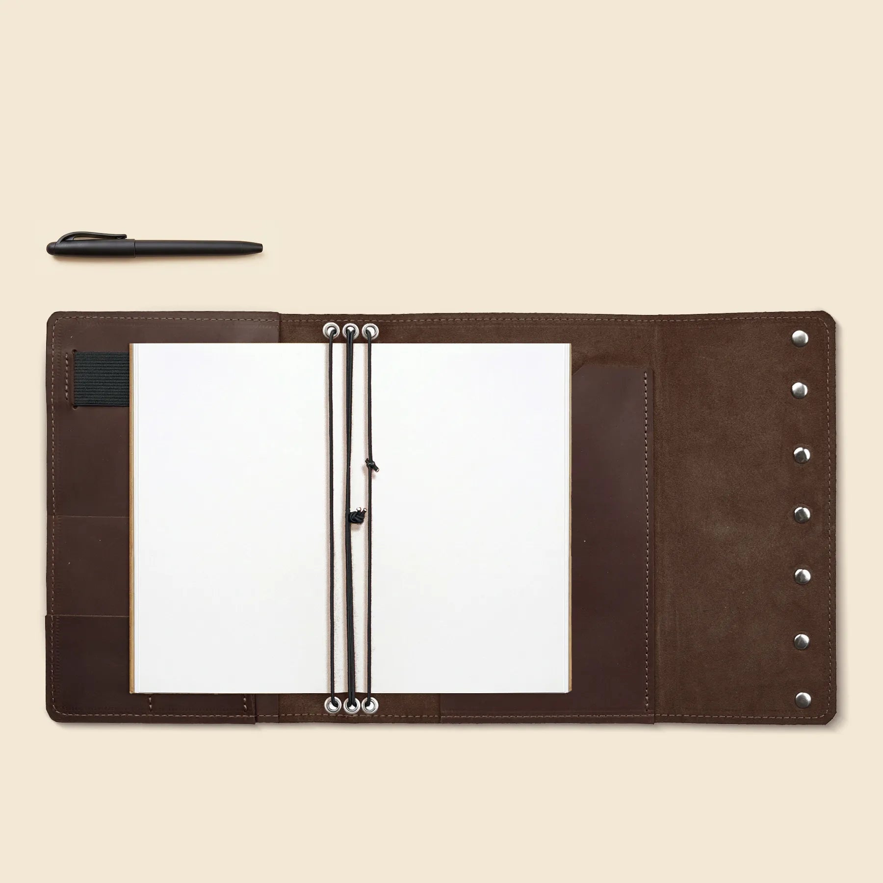 Full leather notebook cover with practical interior storage compartments.