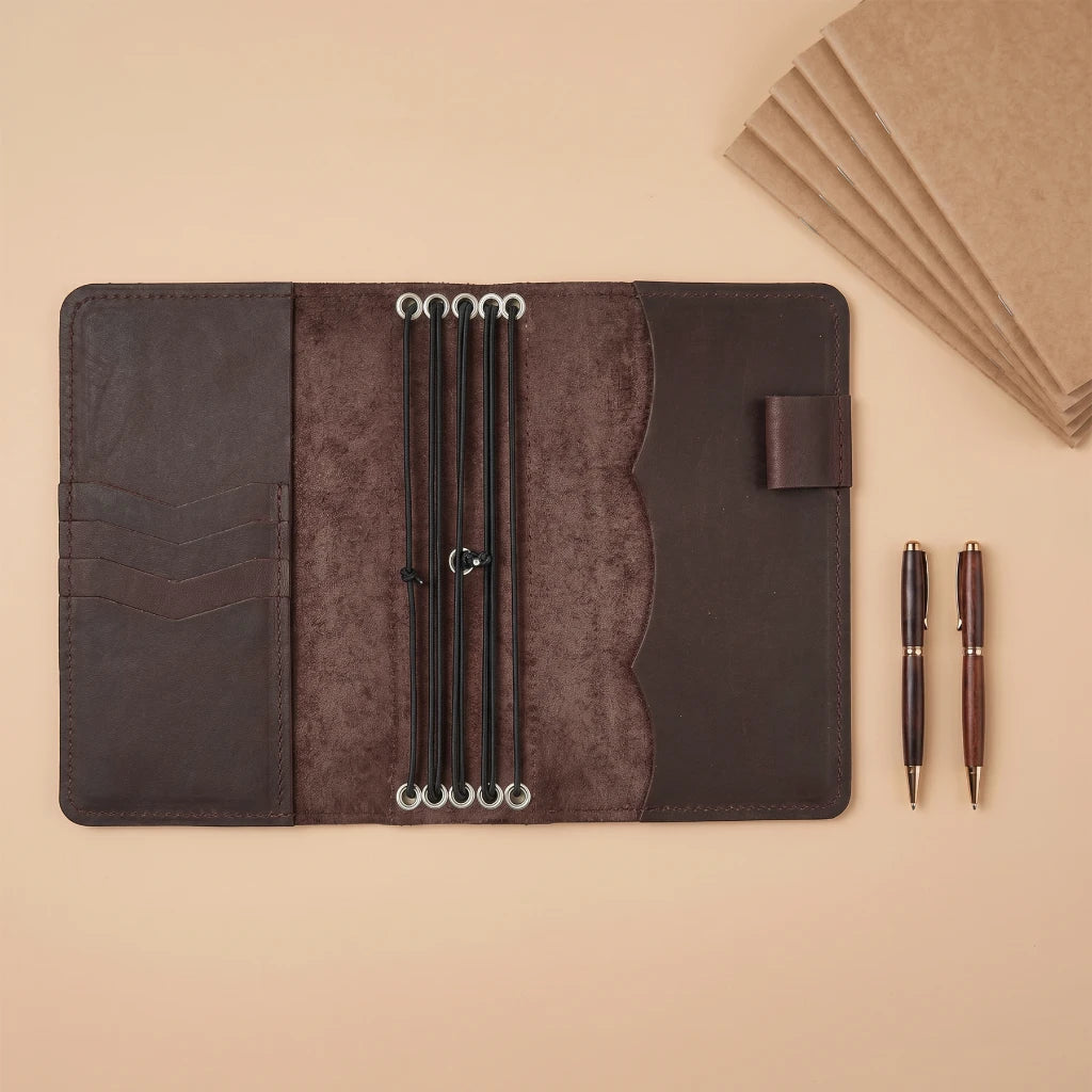 Refillable leather notebook cover designed for organizing multiple journals