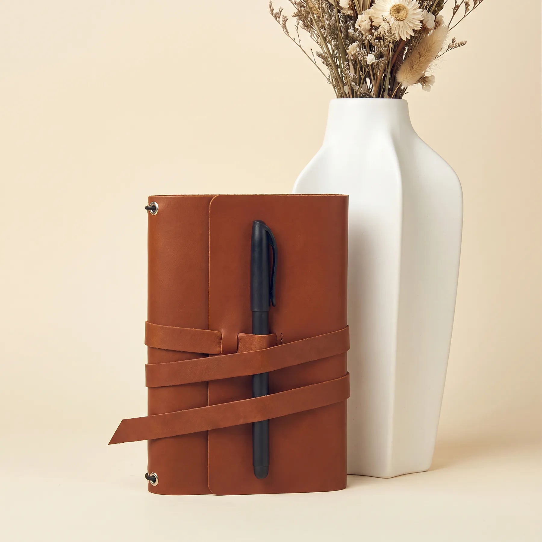 Classic leather notebook cover featuring sturdy pen loops and premium handcrafted leather.