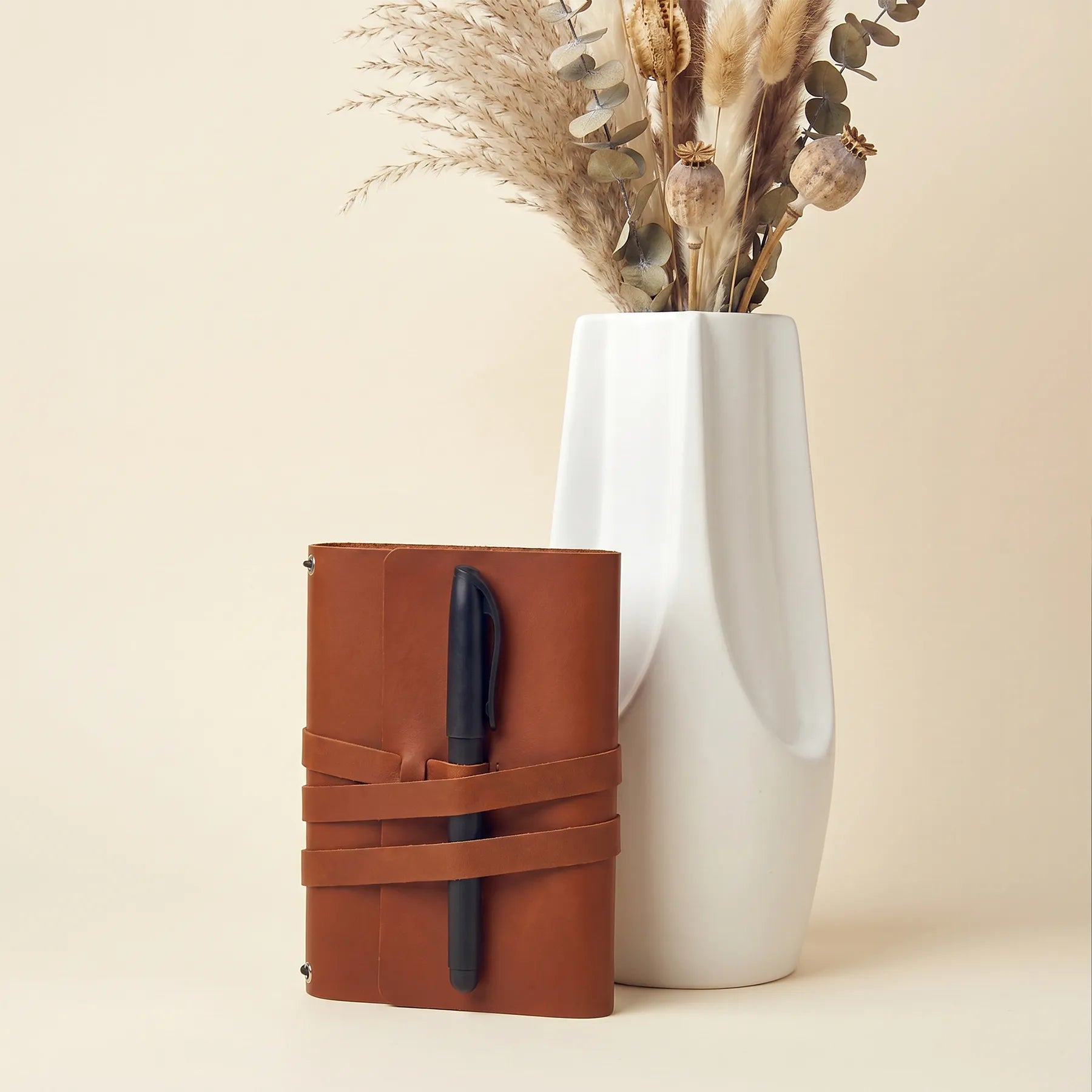 Handmade genuine leather notebook cover with pen loops and elegant refillable journal design