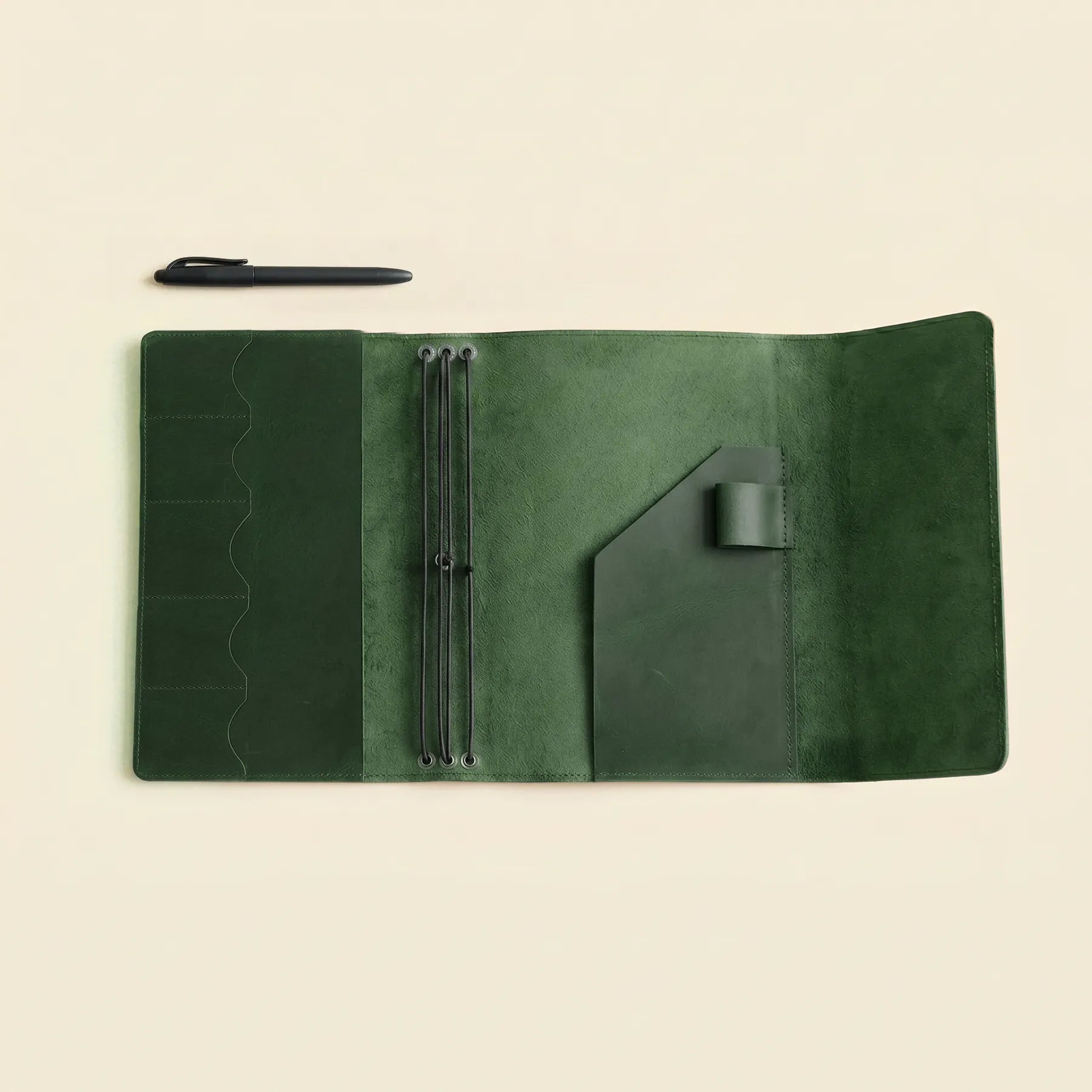 Stylish leather journal organizer with elastic bands and interior compartments.