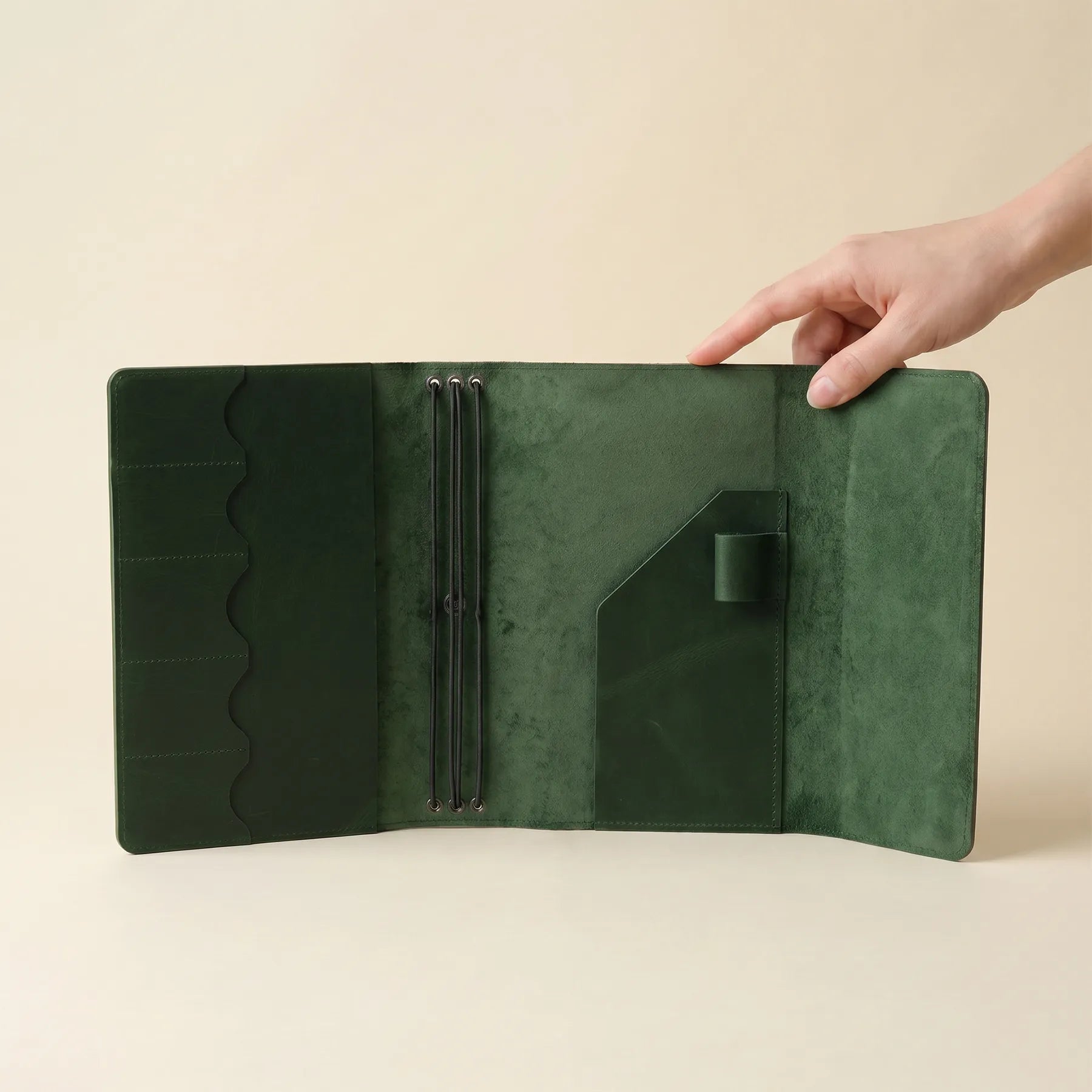 Leather notebook cover designed for multiple inserts and daily organization.