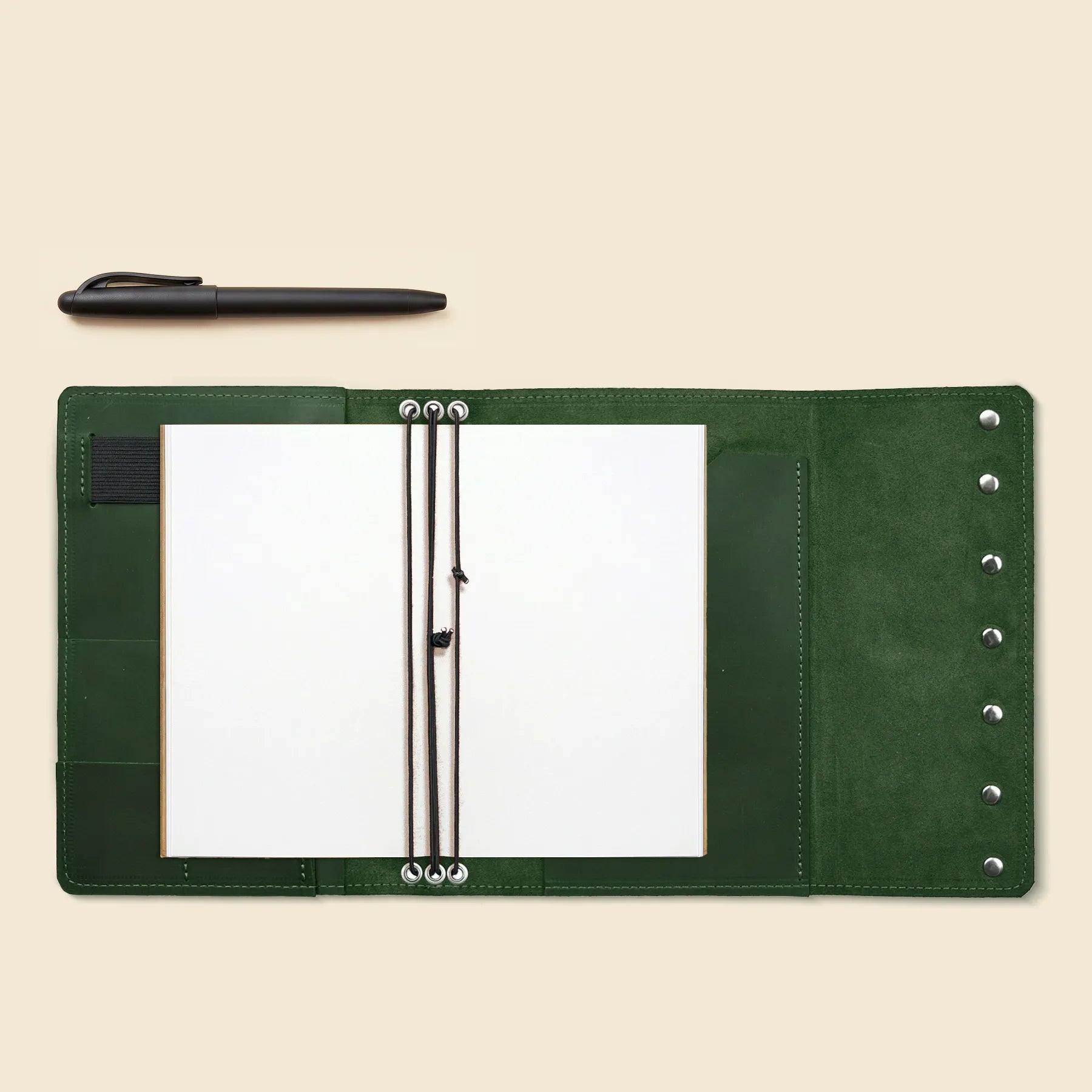 Functional leather journal organizer with card slots and refillable system.