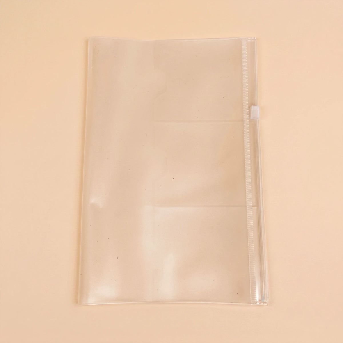 Transparent zipper insert for A5 journals — angled view